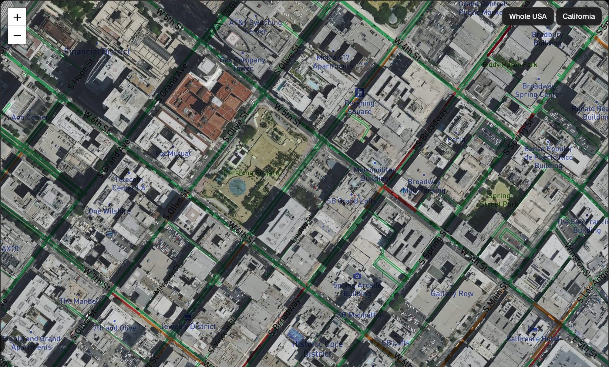 Downtown Los Angeles from above, with green, amber and red traffic lines drawn along the streets